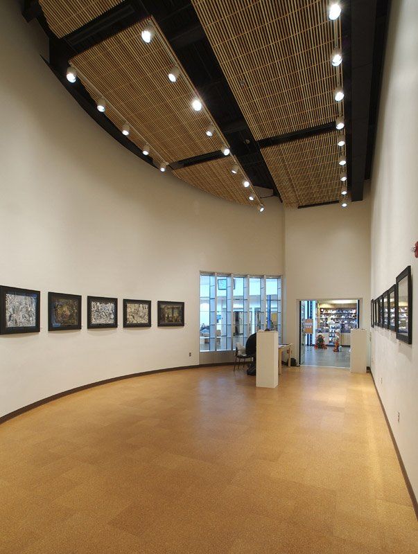 A large room with a lot of pictures on the wall
