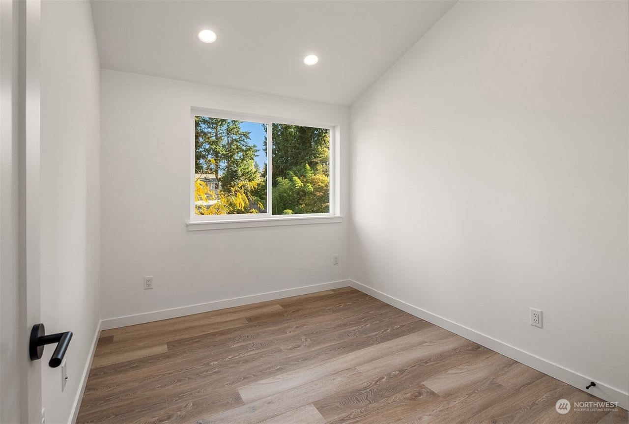 There is a large window in the middle of the room.