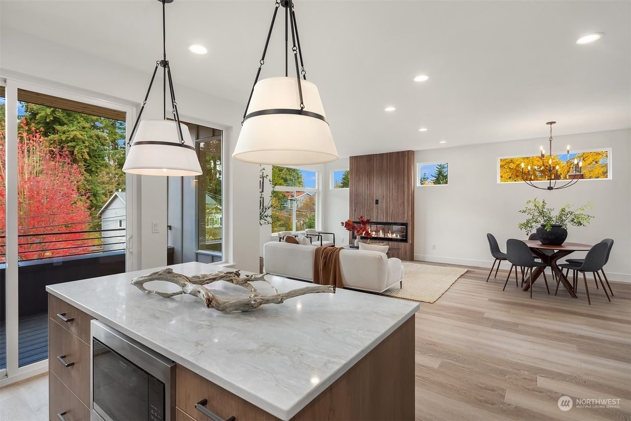 A kitchen with a large island in the middle of the room.