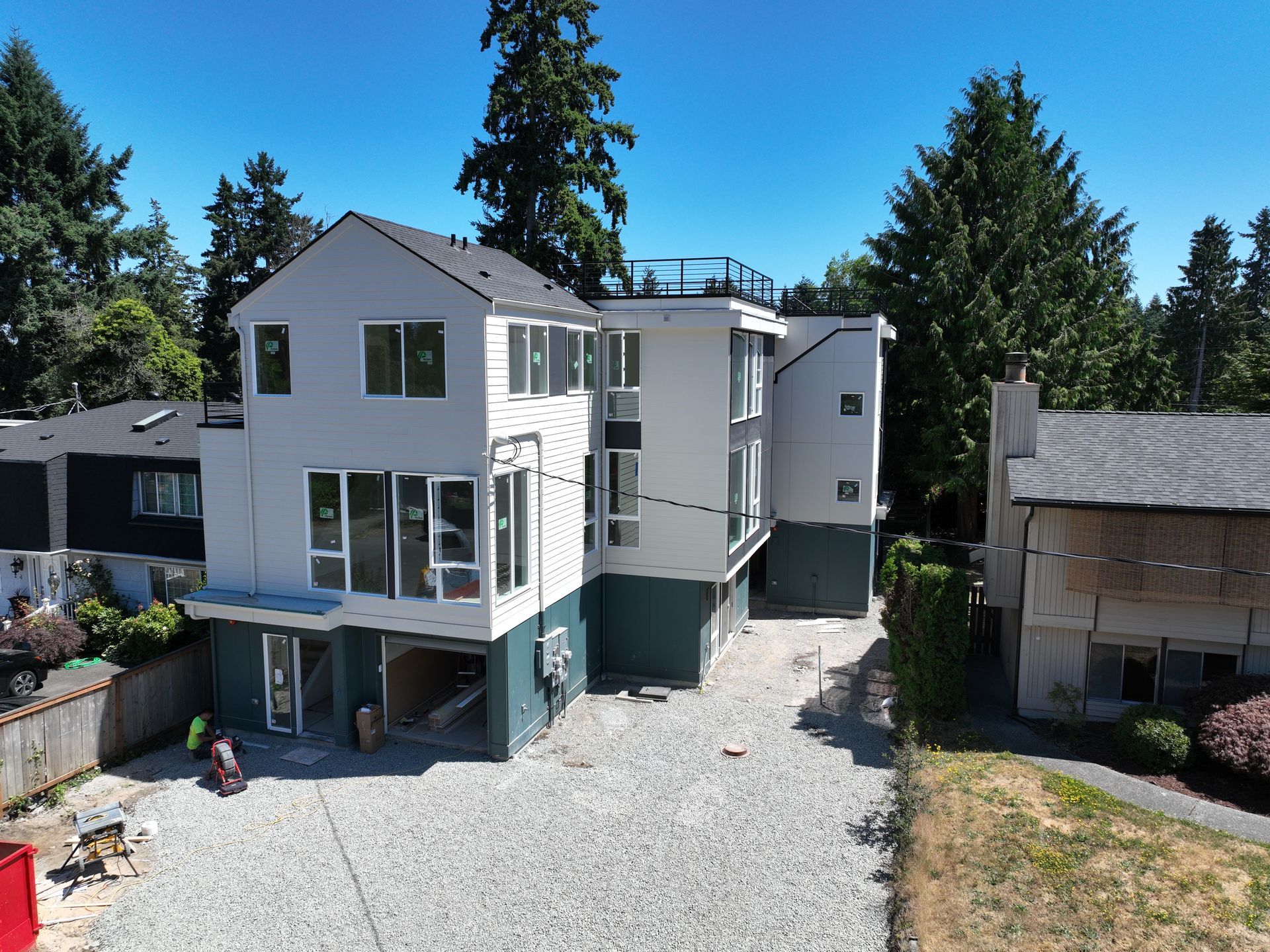 An aerial view of a house with a lot of windows