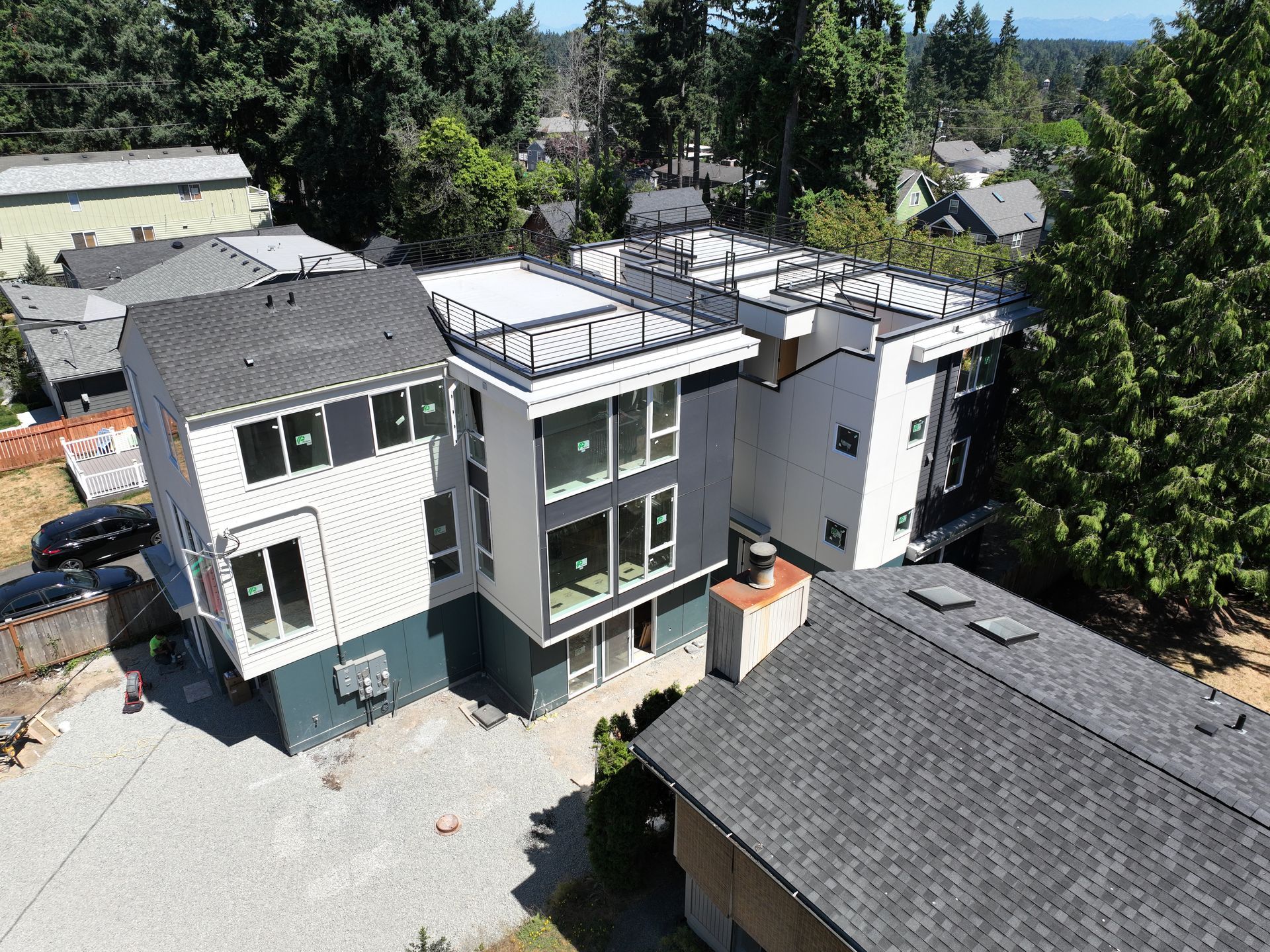 An aerial view of a house with a lot of windows
