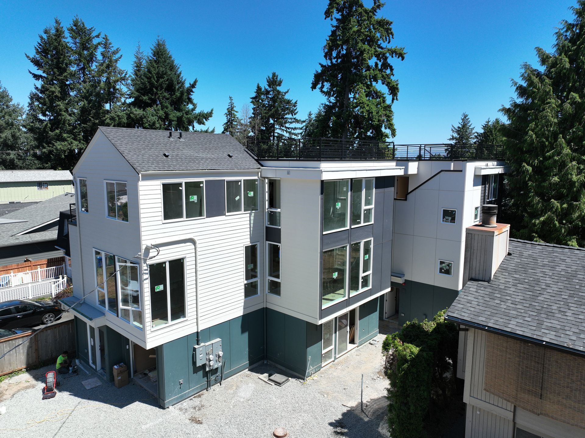 An aerial view of a house with a lot of windows