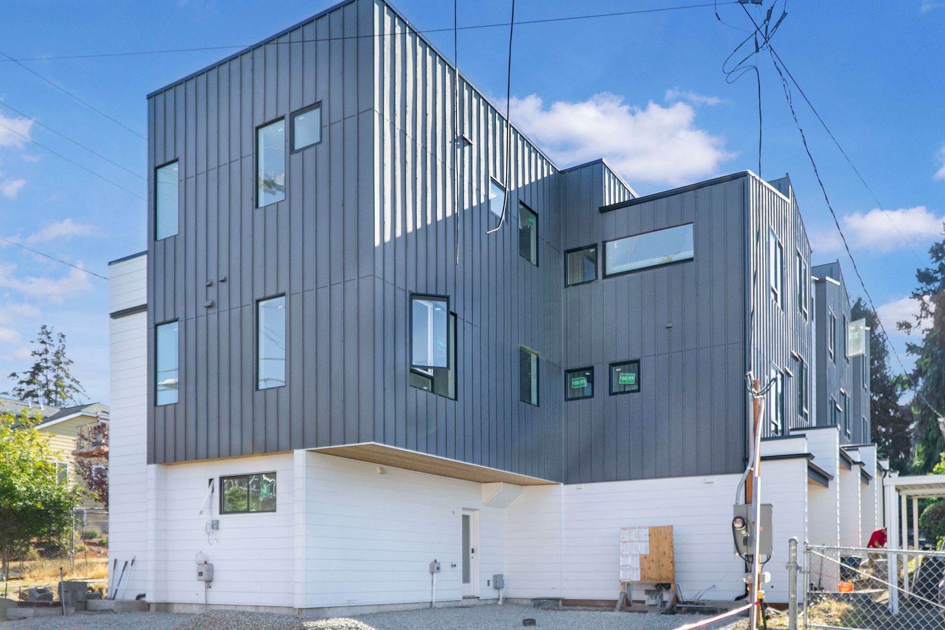 A large building with a lot of windows is being built.