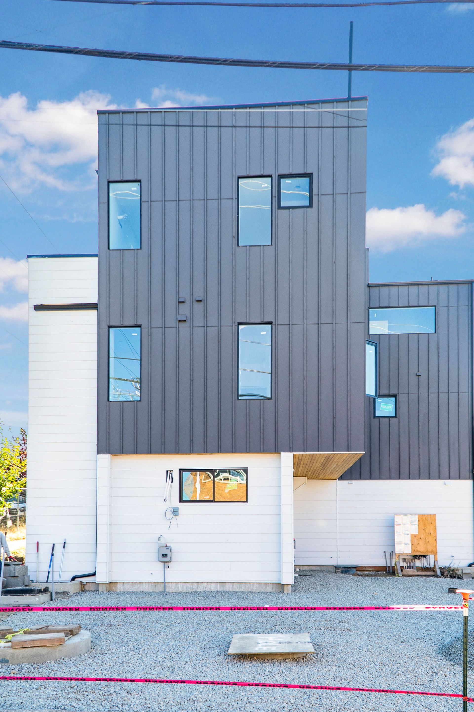 A large building with a lot of windows is being built.