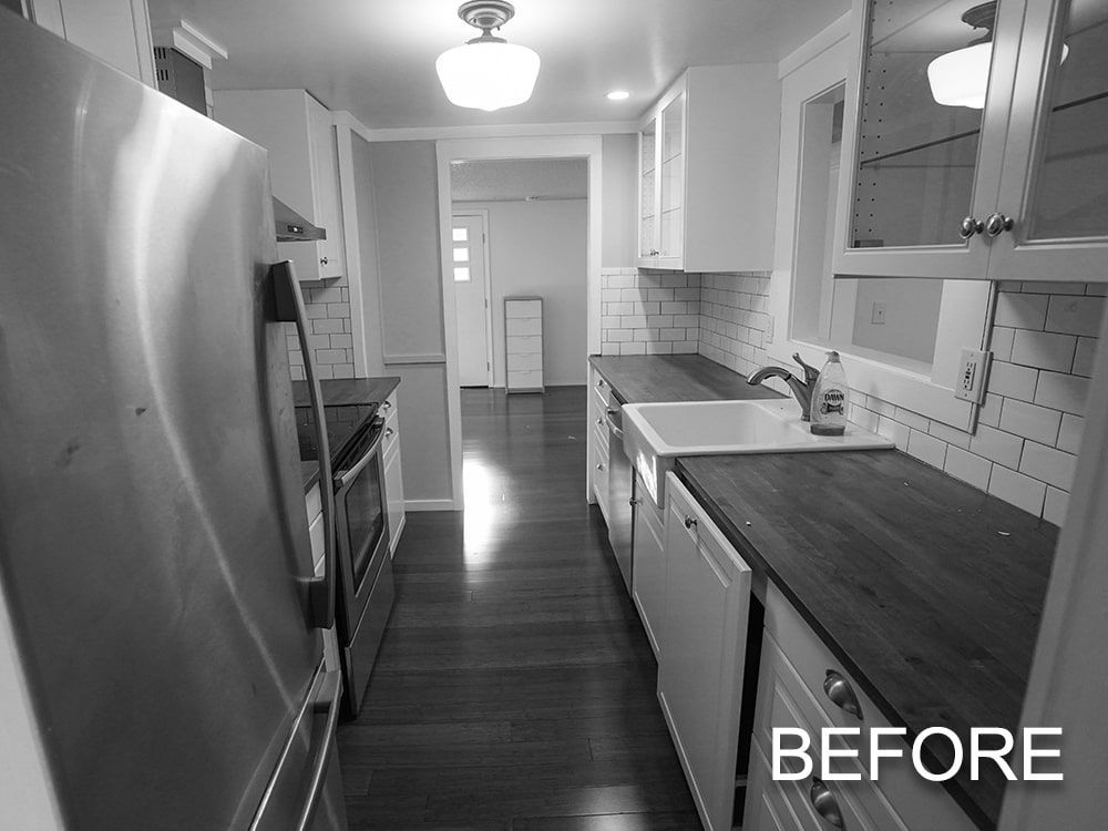 A before photo of a kitchen with stainless steel appliances