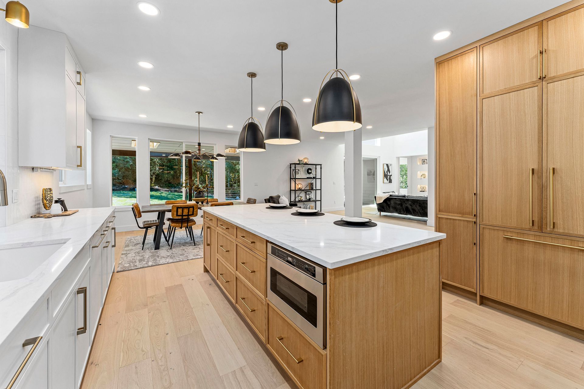 There is a large island in the middle of the kitchen.
