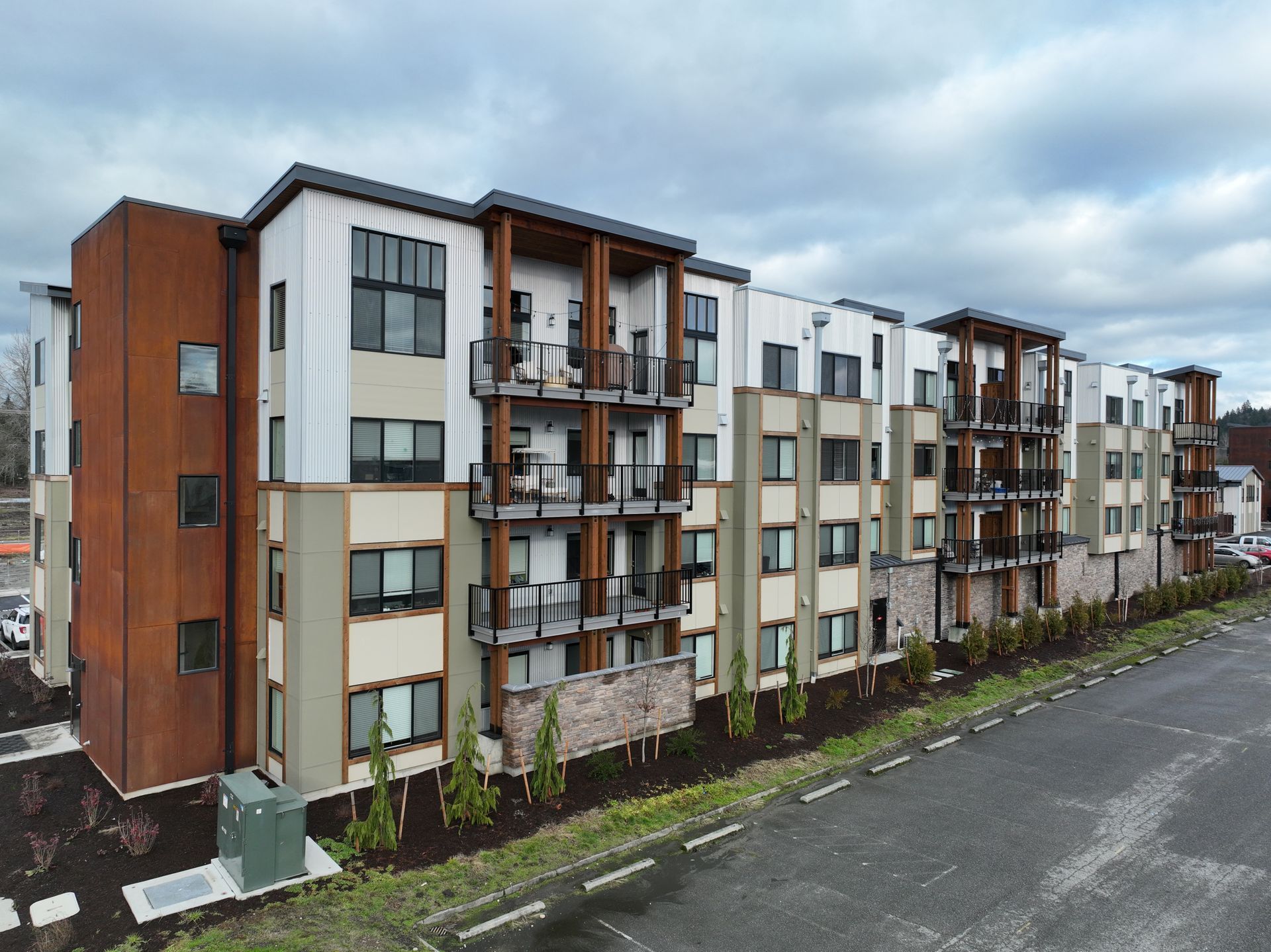 A large apartment building with a lot of windows and balconies