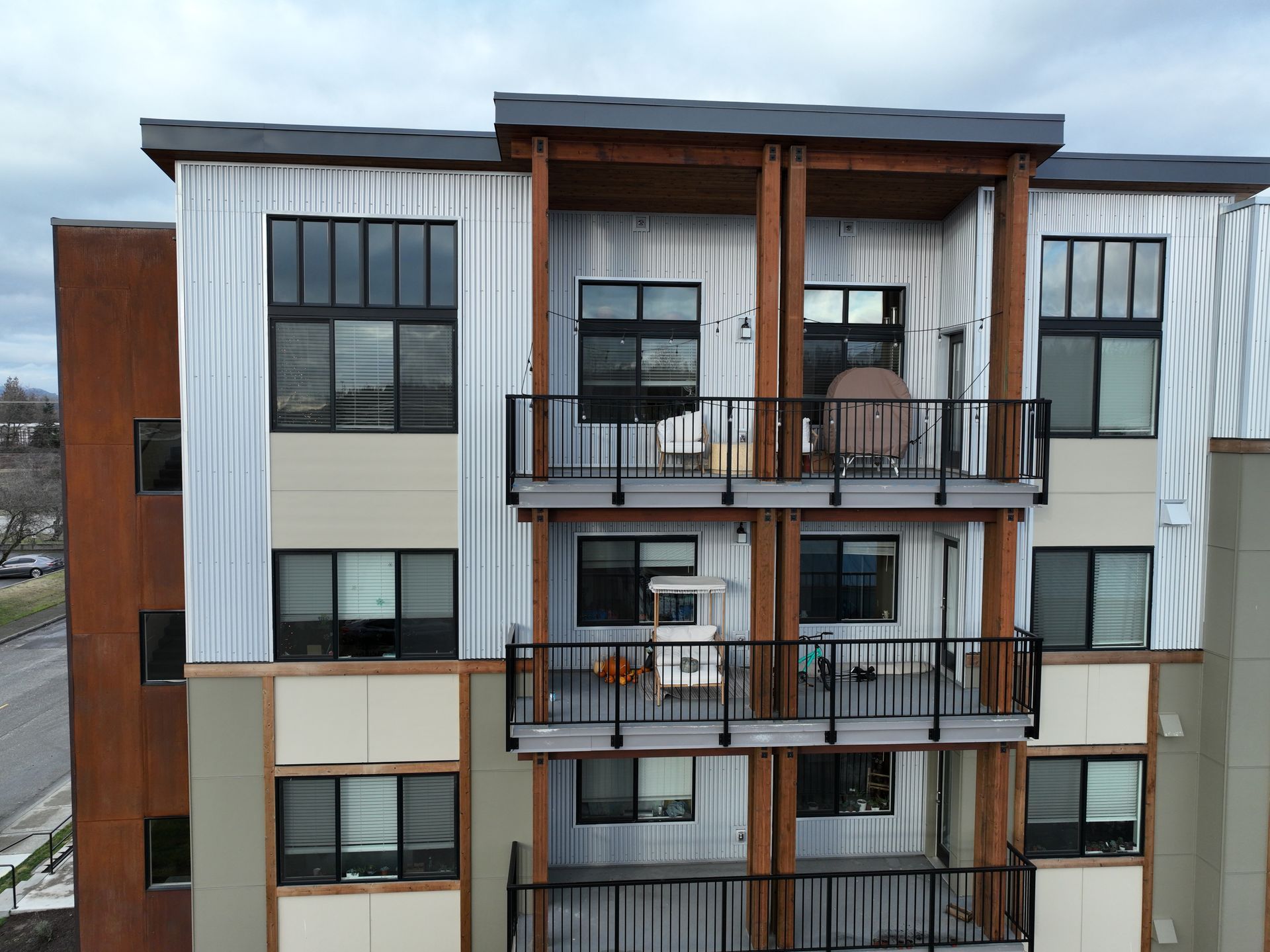 A large apartment building with lots of windows and balconies