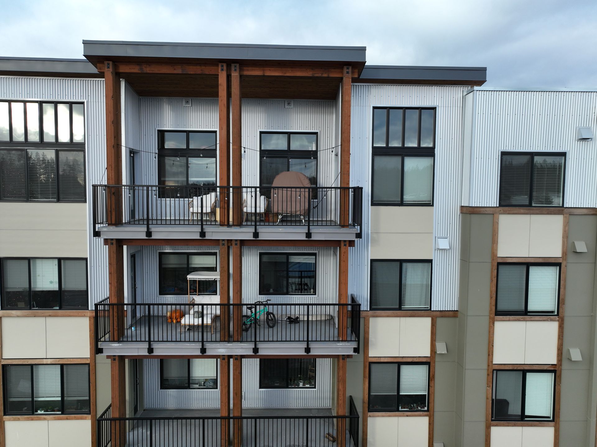 A large apartment building with lots of windows and balconies