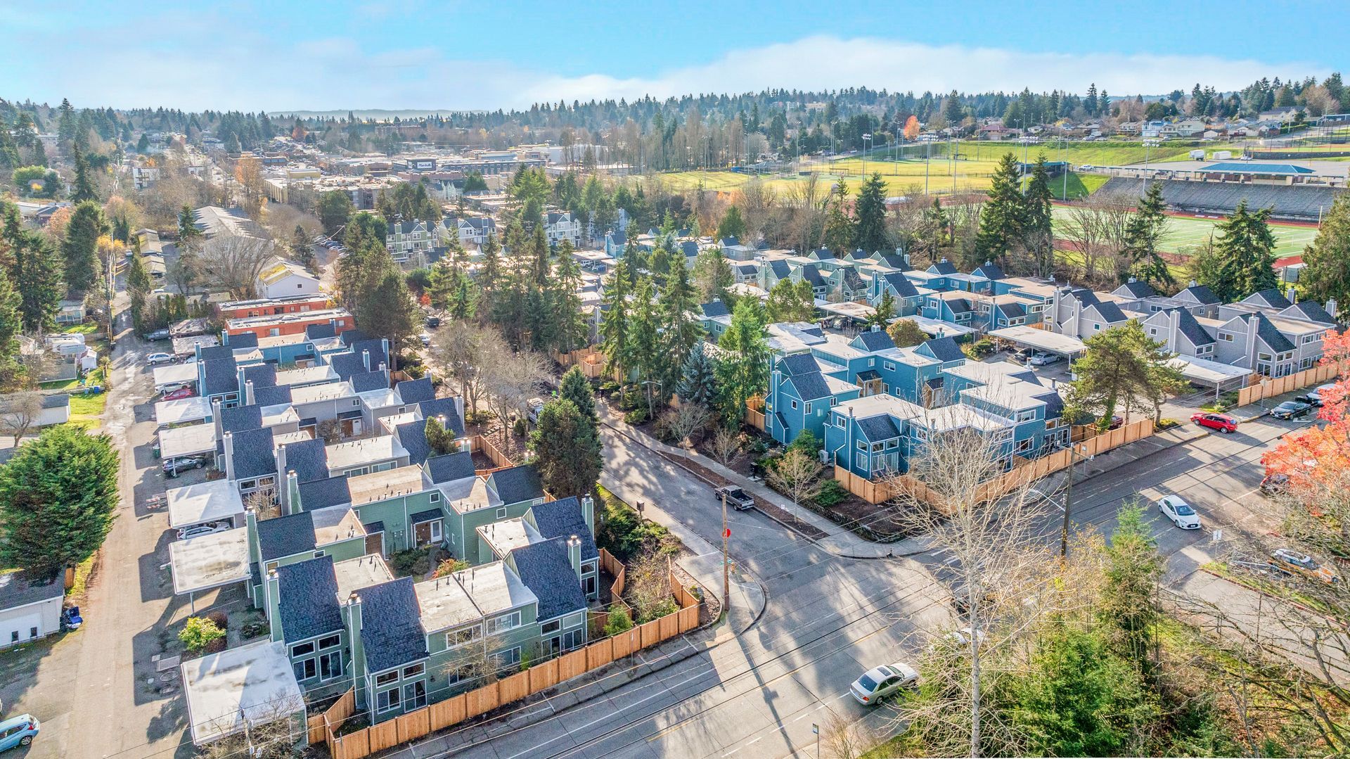 An aerial view of a residential area with lots of houses and trees.