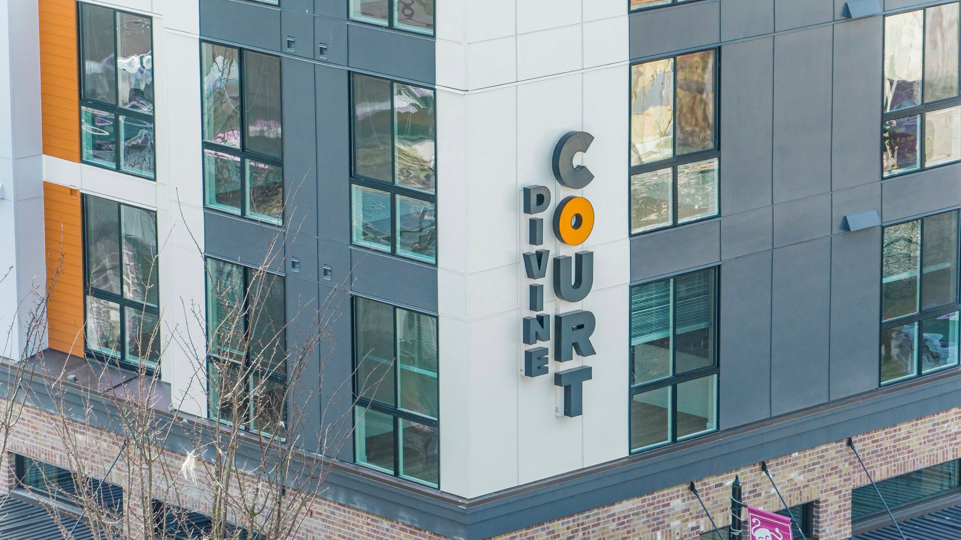 An aerial view of a large building with a lot of windows.