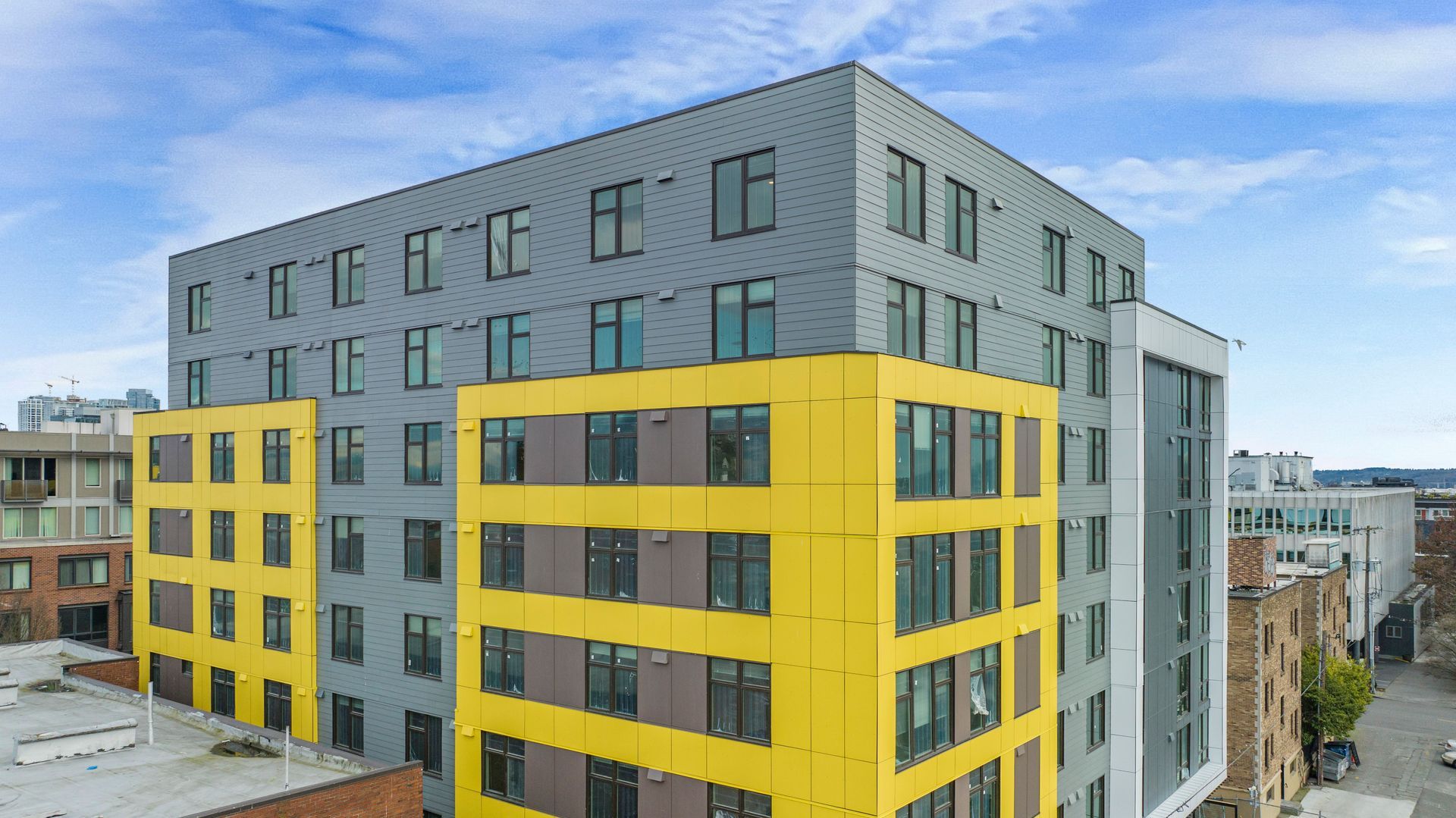 An aerial view of a large building with a lot of windows.