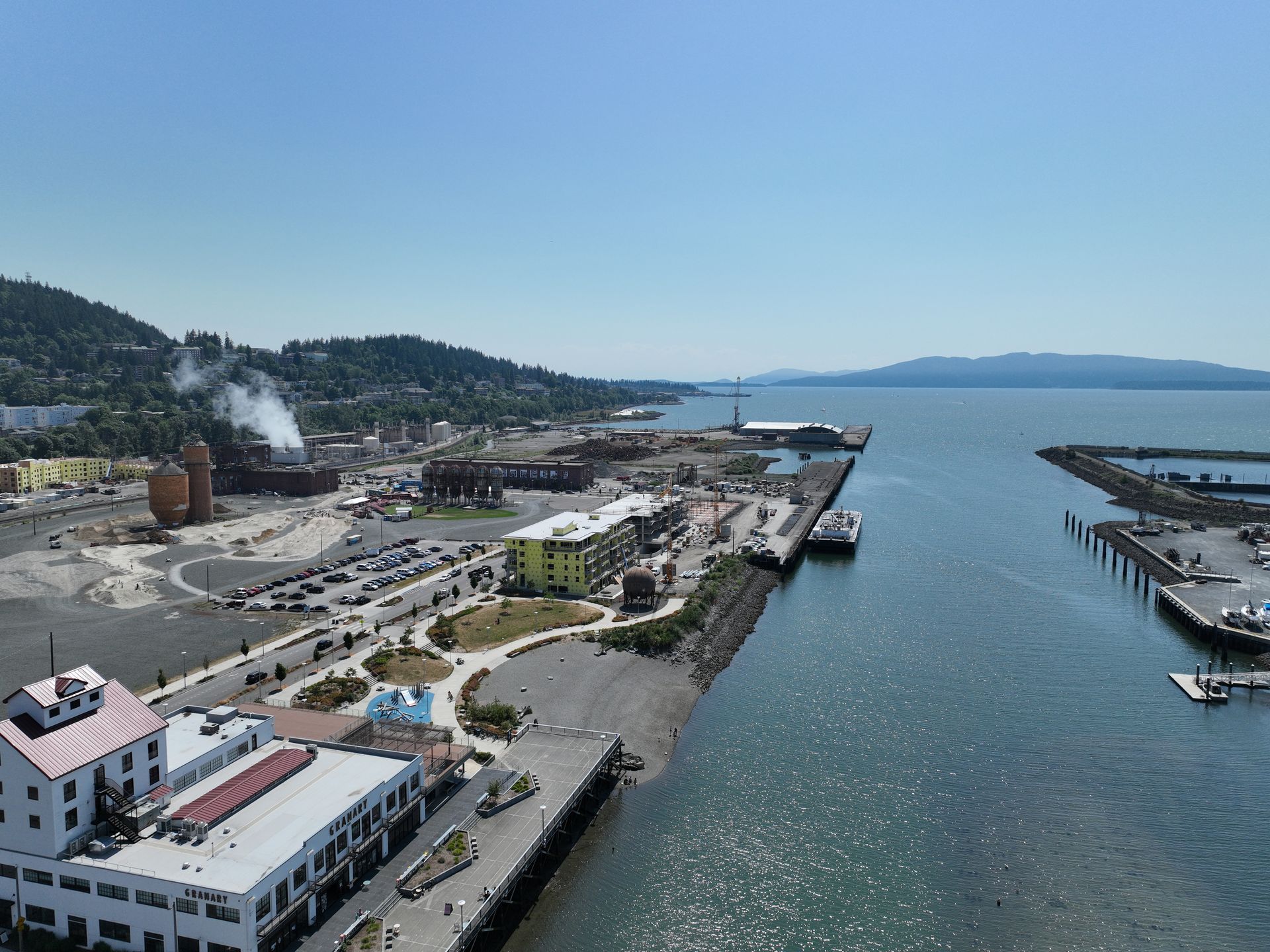 An aerial view of a city and a body of water