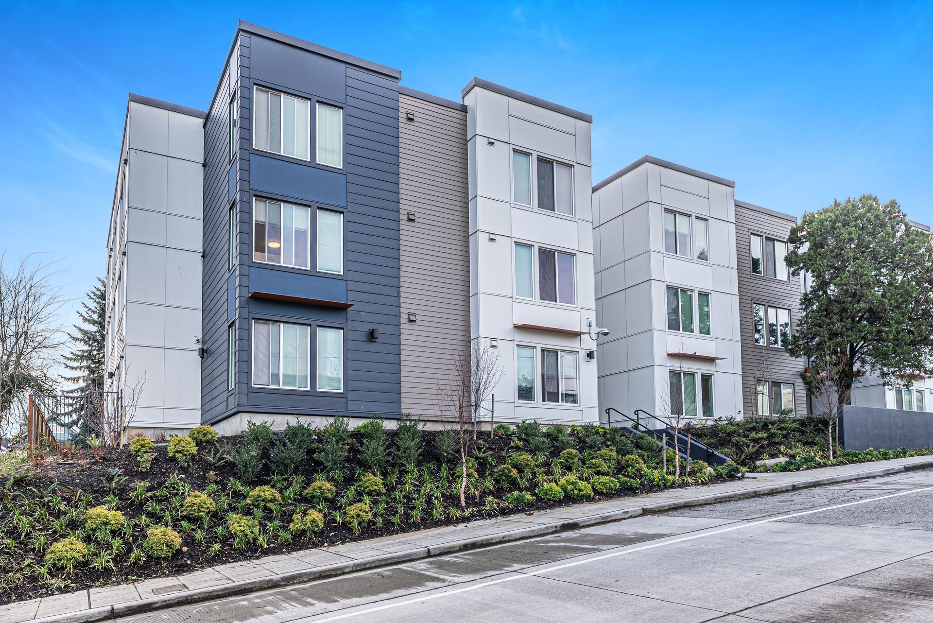 A large apartment building with a lot of windows