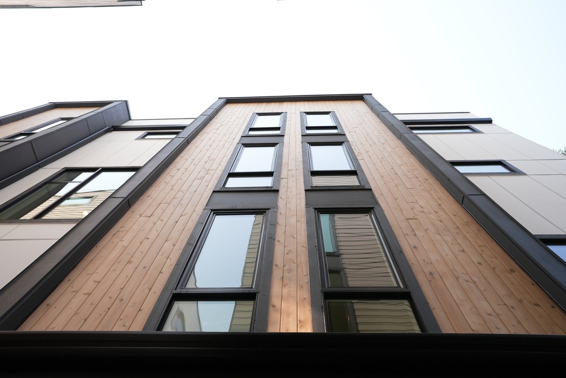Looking up at a building with lots of windows