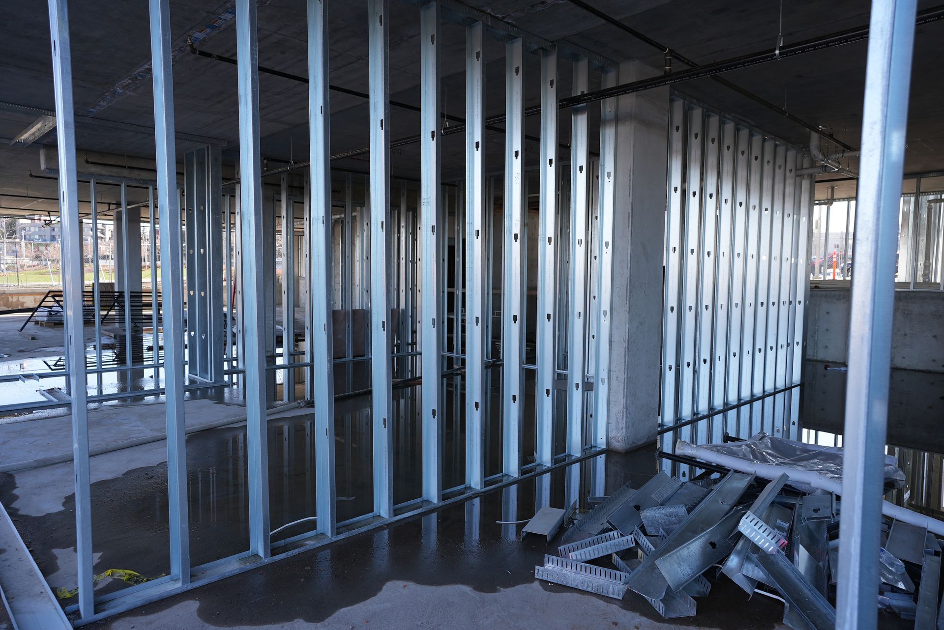 A building under construction with a lot of metal frames