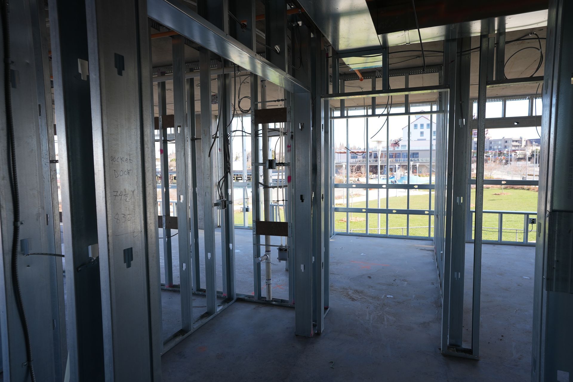The inside of a building under construction with a lot of windows