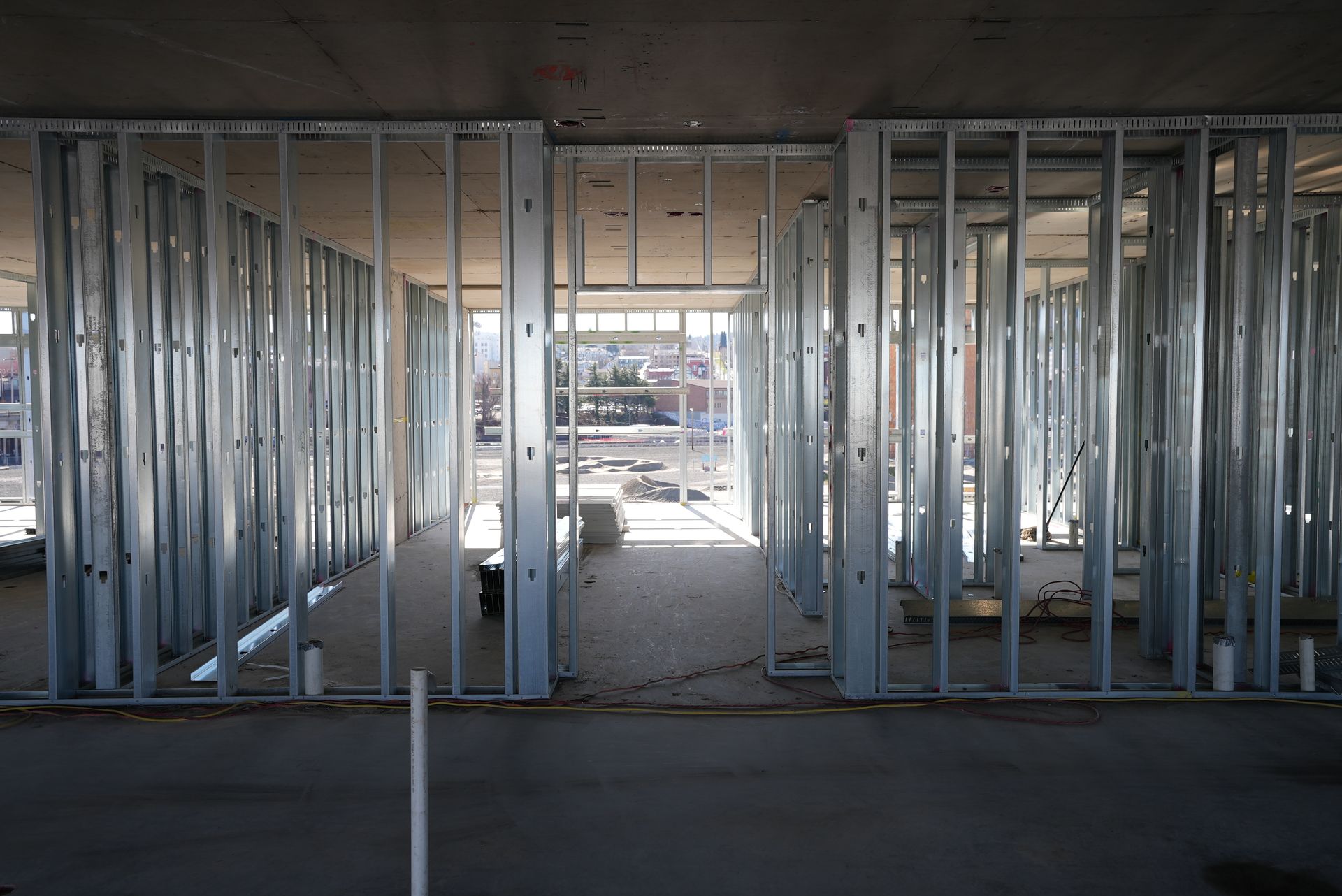 A building under construction with a lot of metal frames.