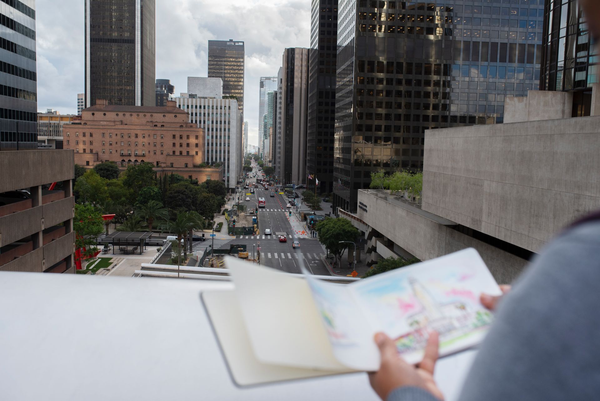 A person is looking at a map of a city.