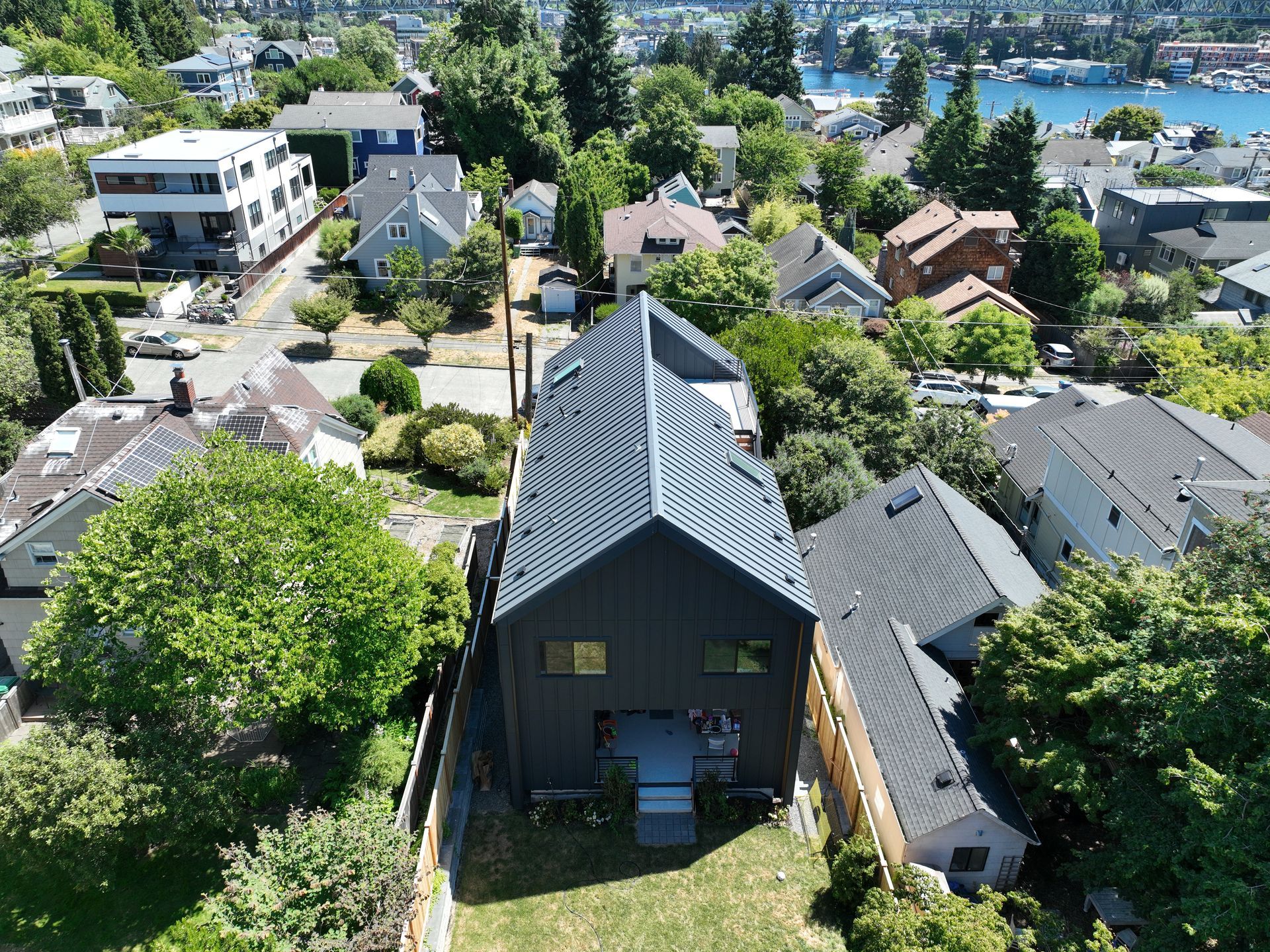 An aerial view of a house in a residential area