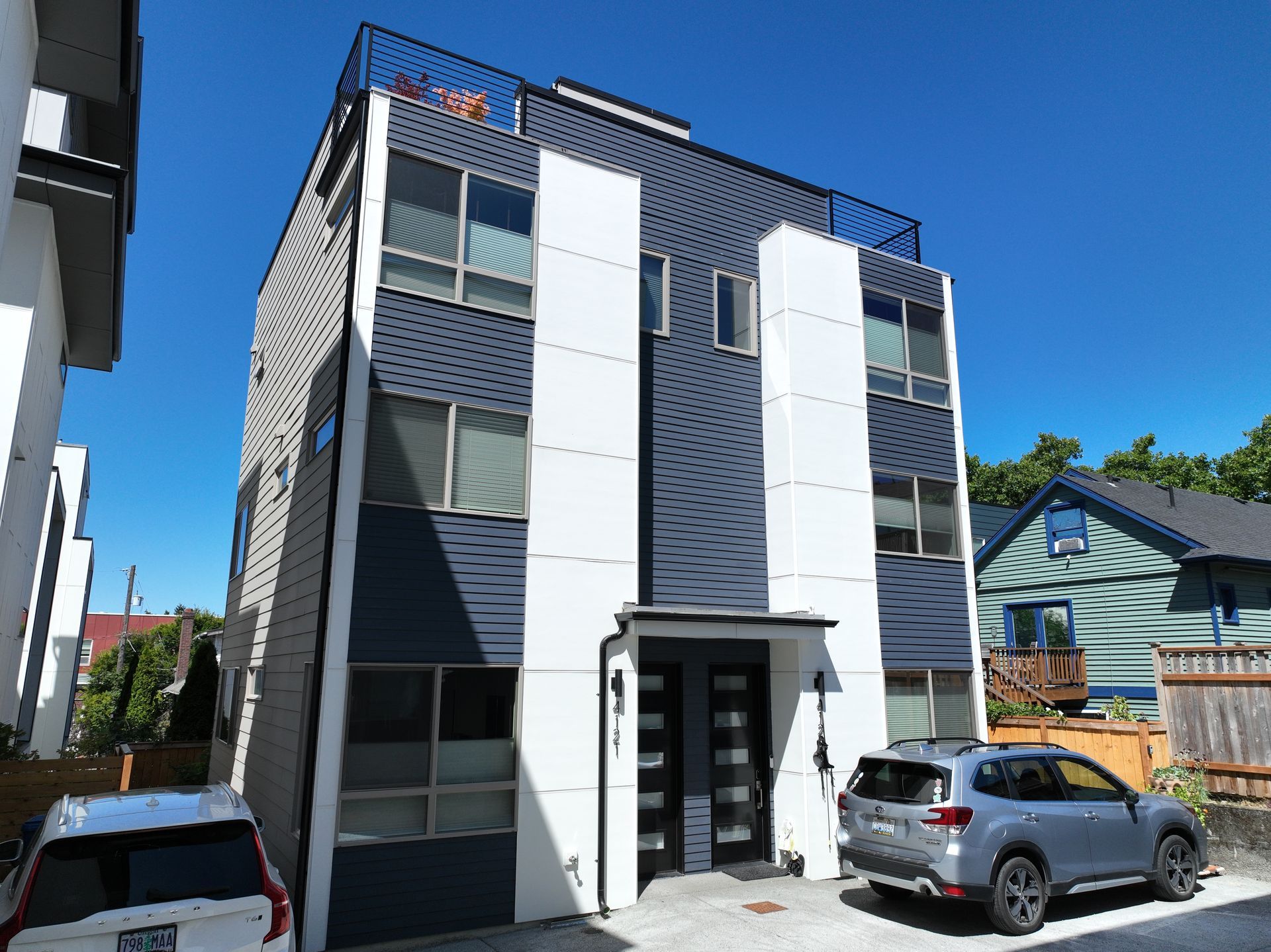 A building with a car parked in front of it