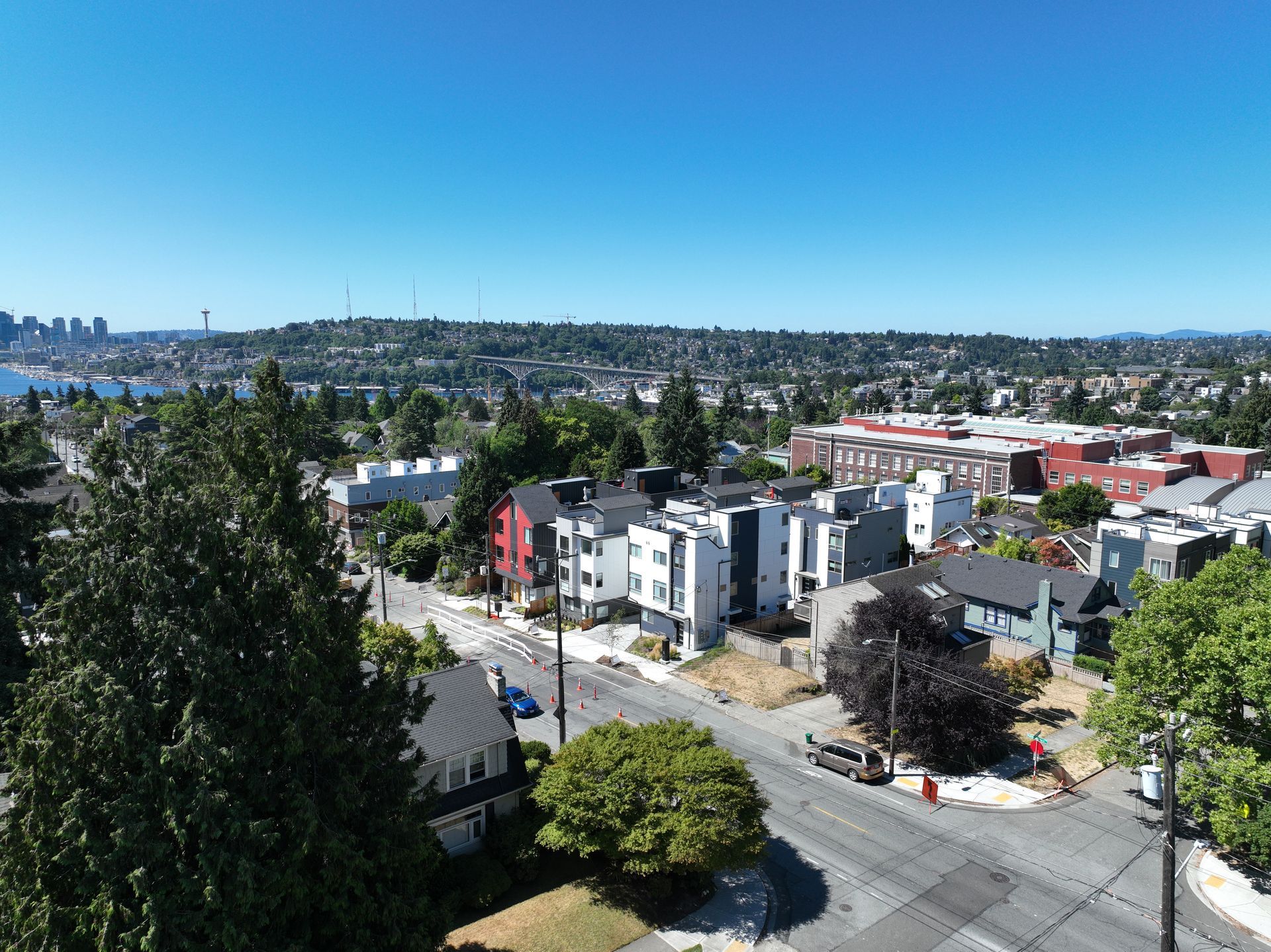 An aerial view of a city with a lot of houses and trees