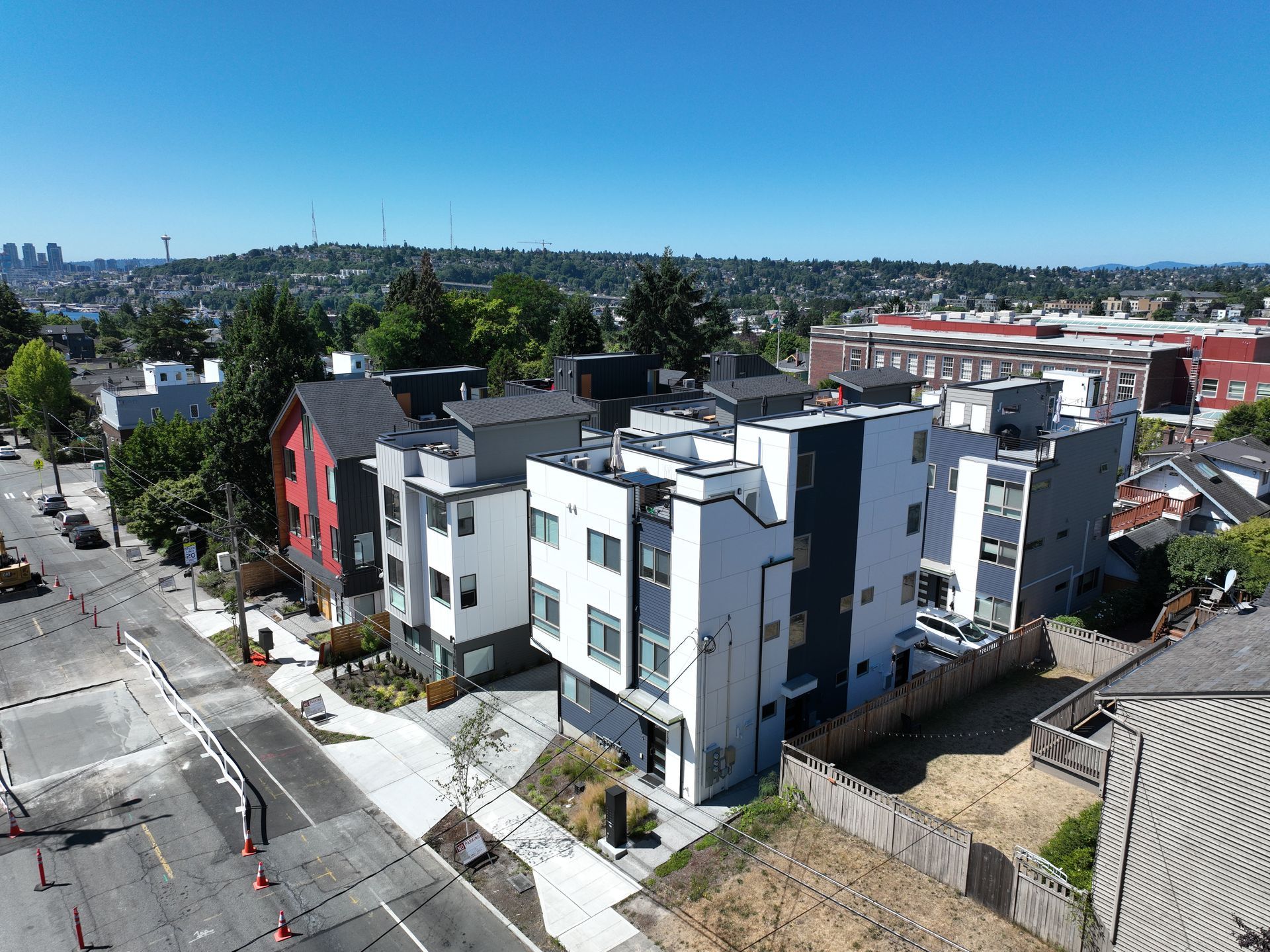 An aerial view of a city with a lot of buildings and trees