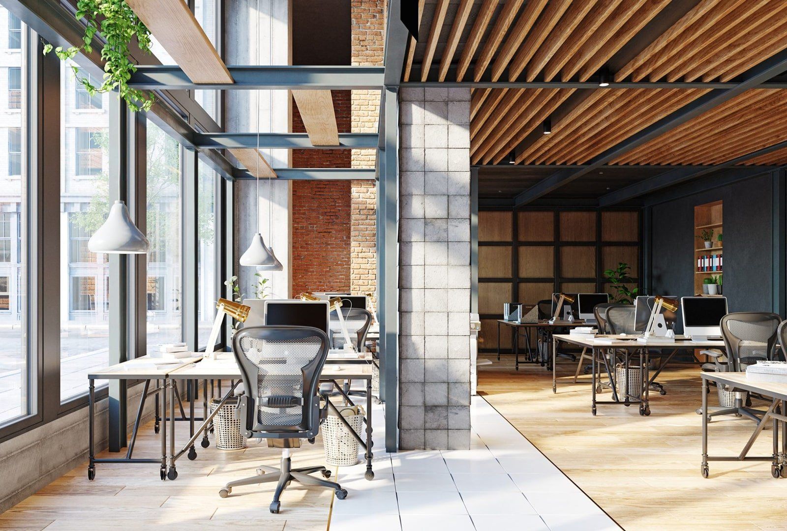 Modern steel commercial building An empty office with lots of windows and tables and chairs.
