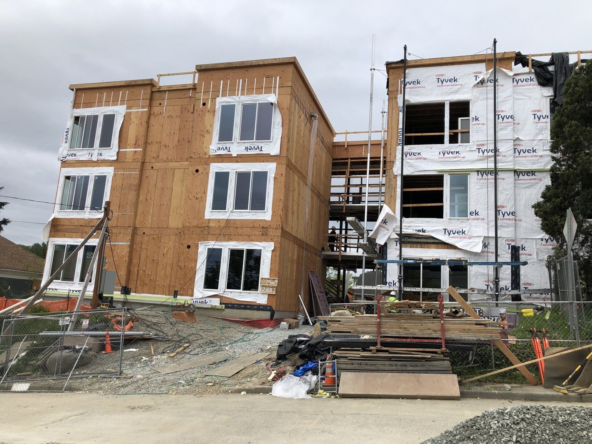 A large building under construction with a lot of windows.