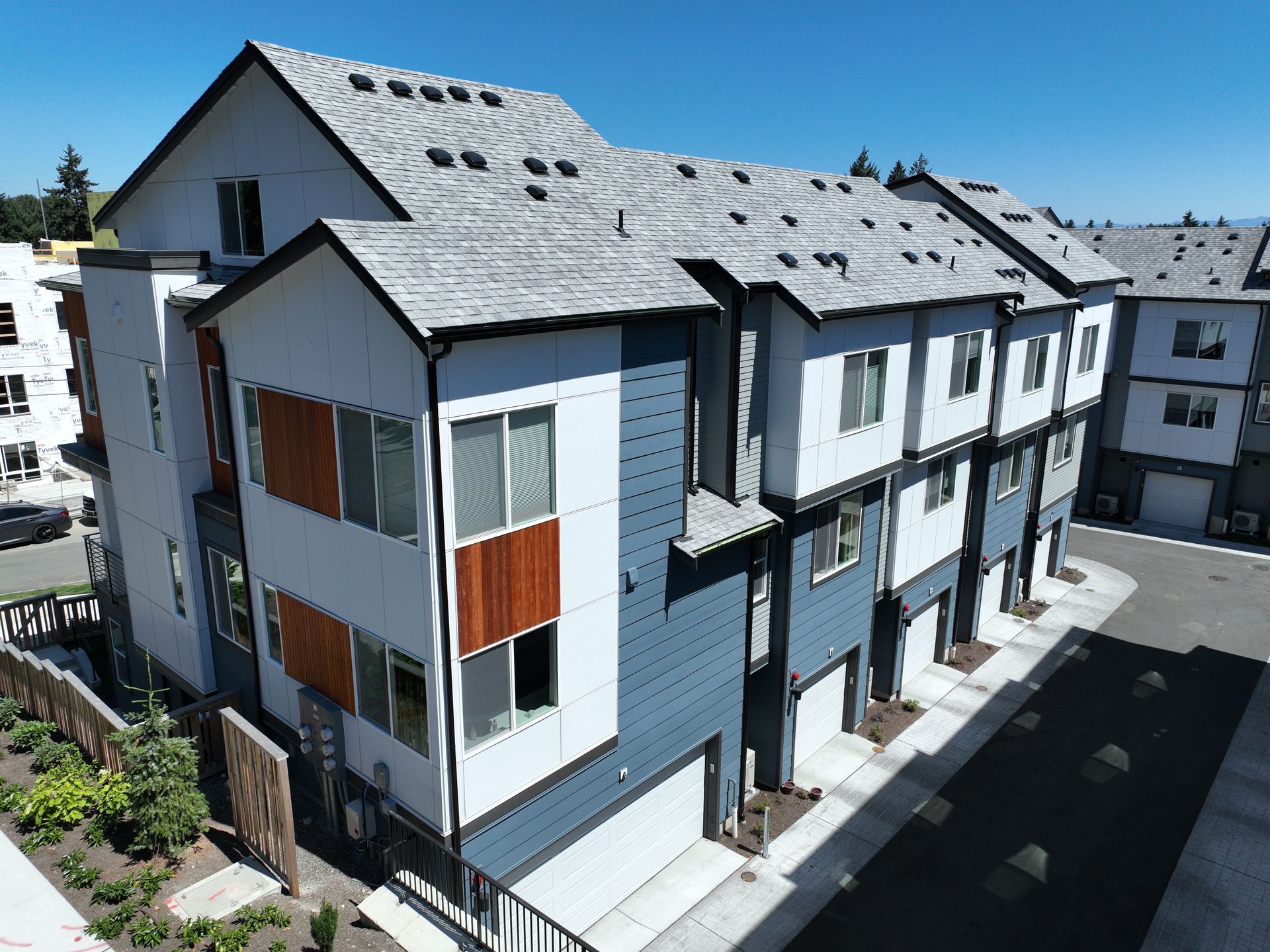 An aerial view of a row of apartment buildings