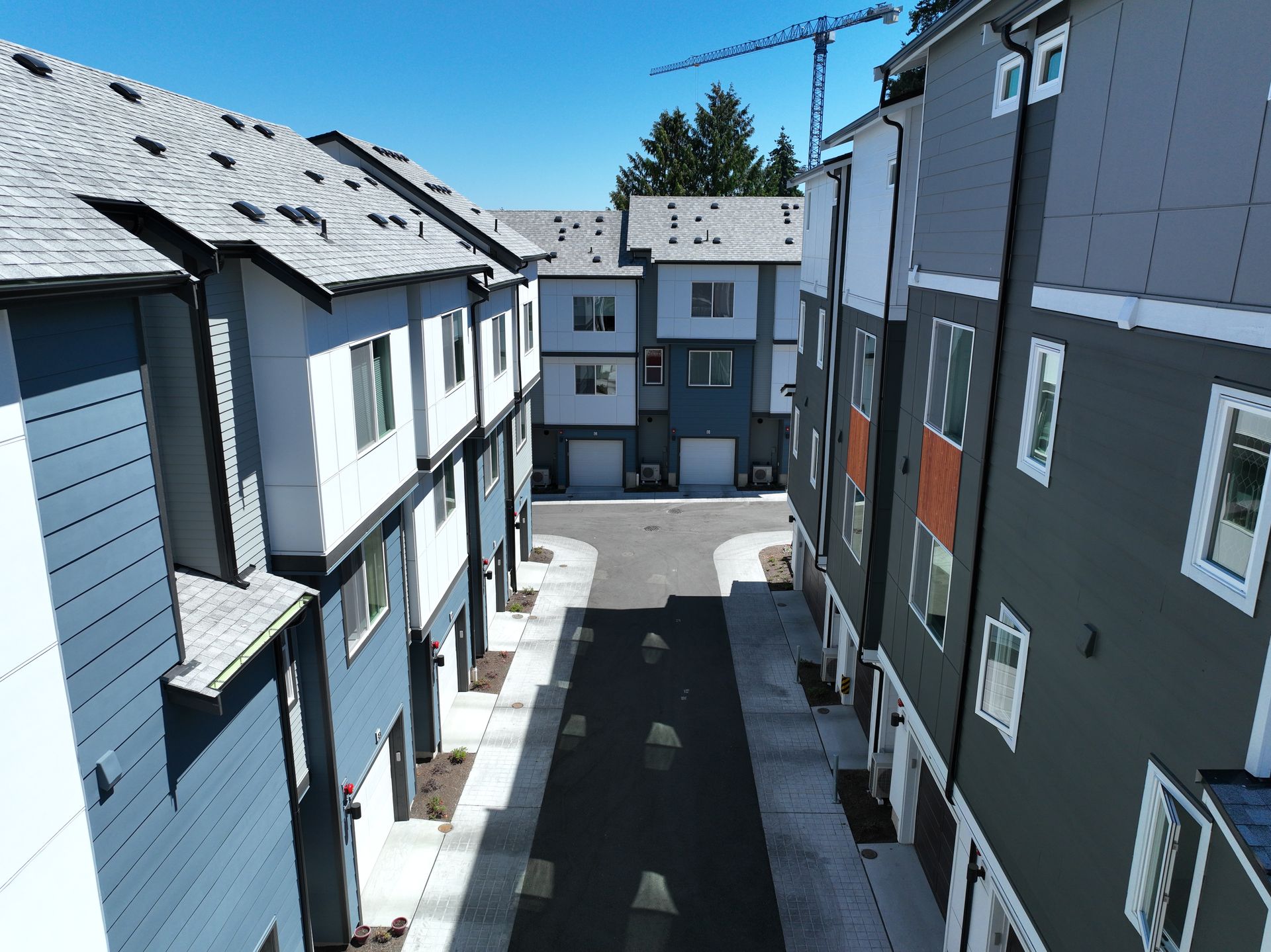 An aerial view of a row of apartment buildings