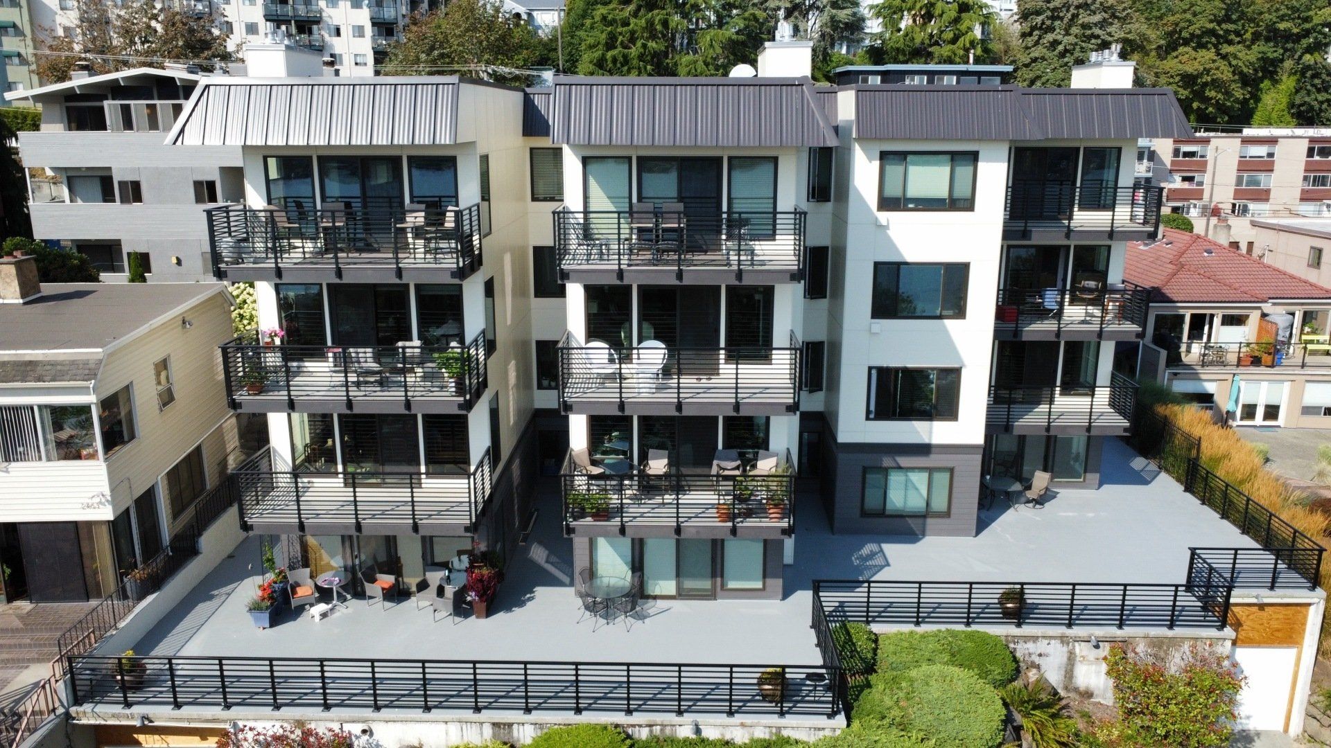 An aerial view of a large apartment building with balconies