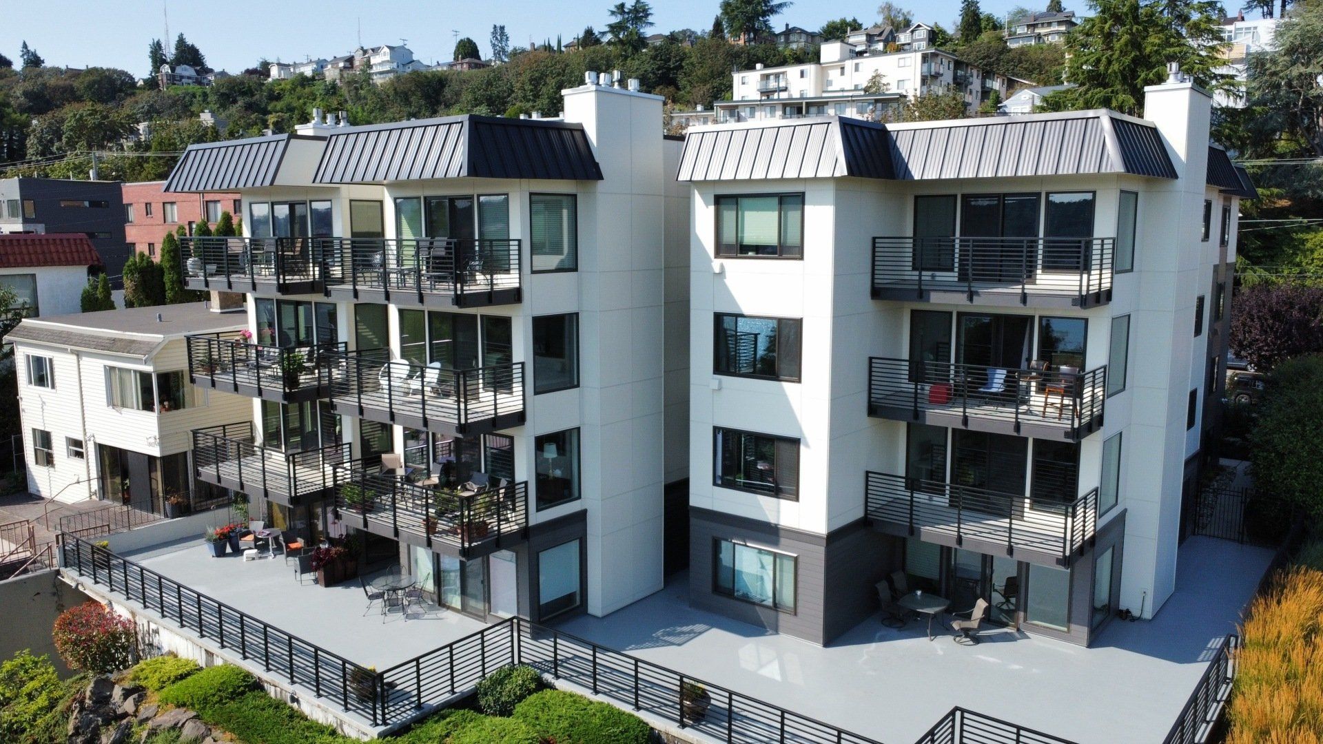 An aerial view of a large apartment building with balconies