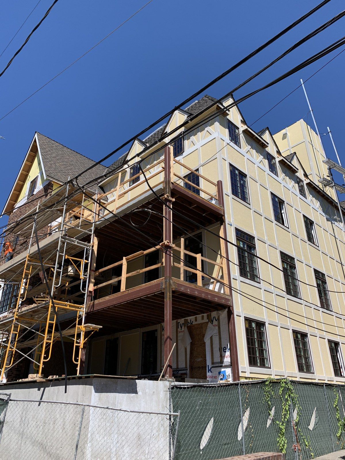 A large building under construction with scaffolding around it