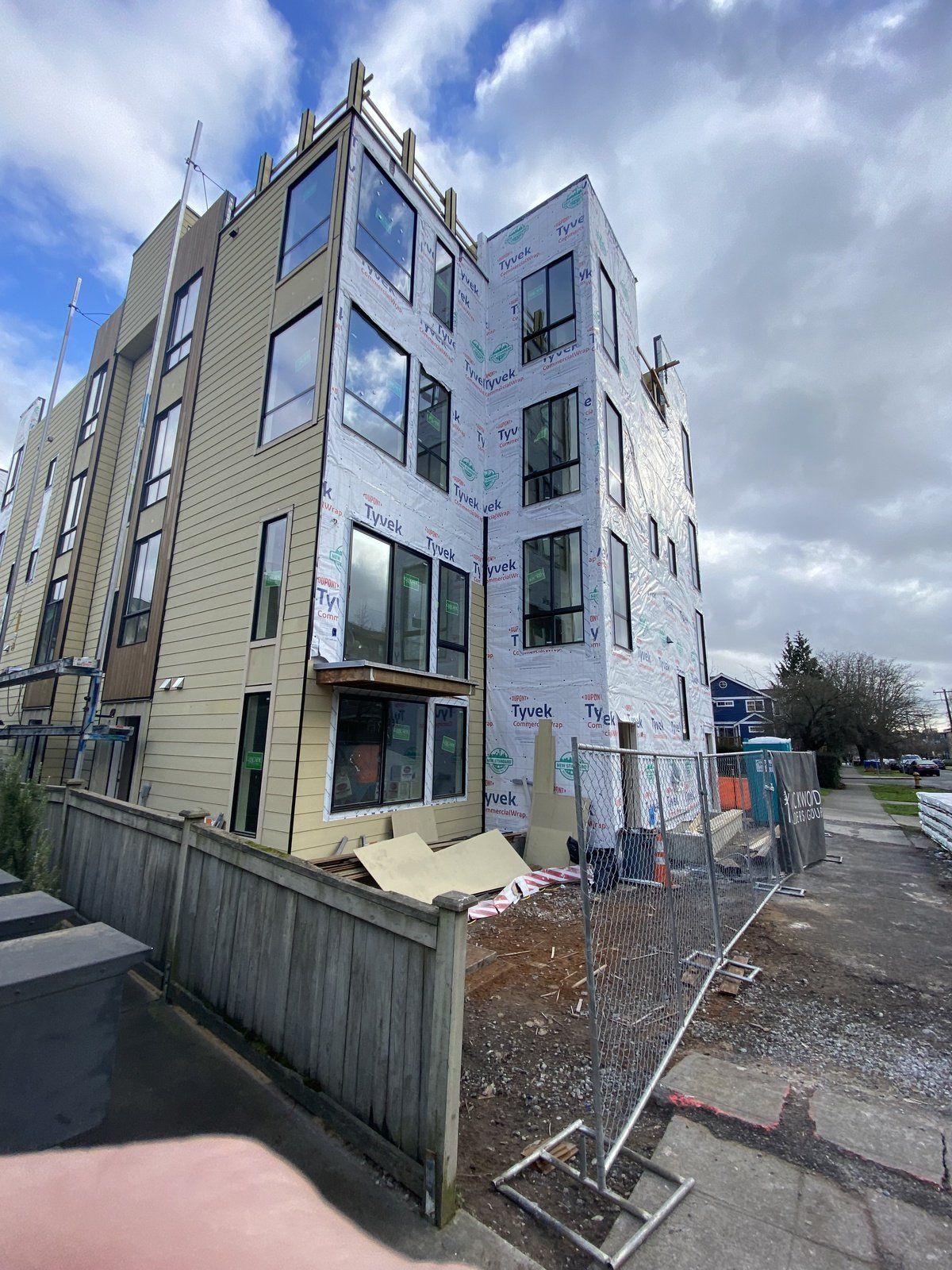 A large building with a lot of windows is being built.