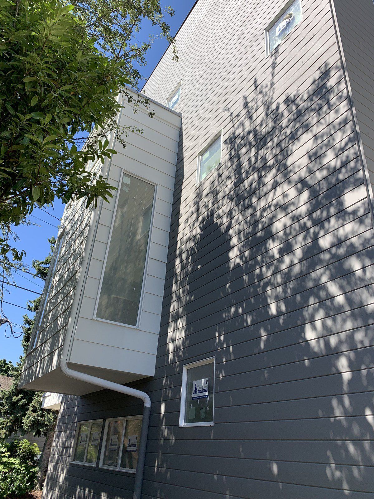 A large building with a balcony on the side of it.
