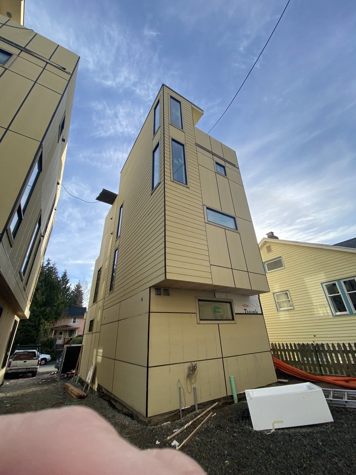 A large building with a lot of windows is being built.