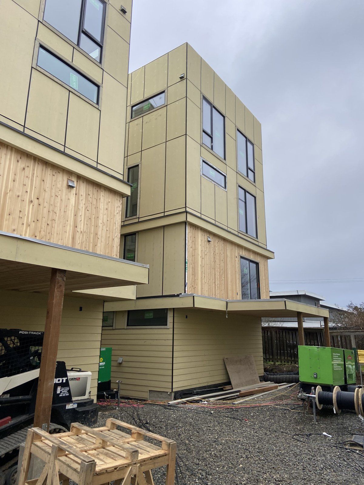 A large building with a lot of windows is being built.