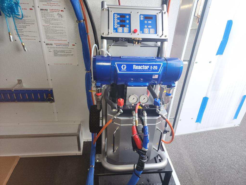 A blue and silver machine with the word baker on it