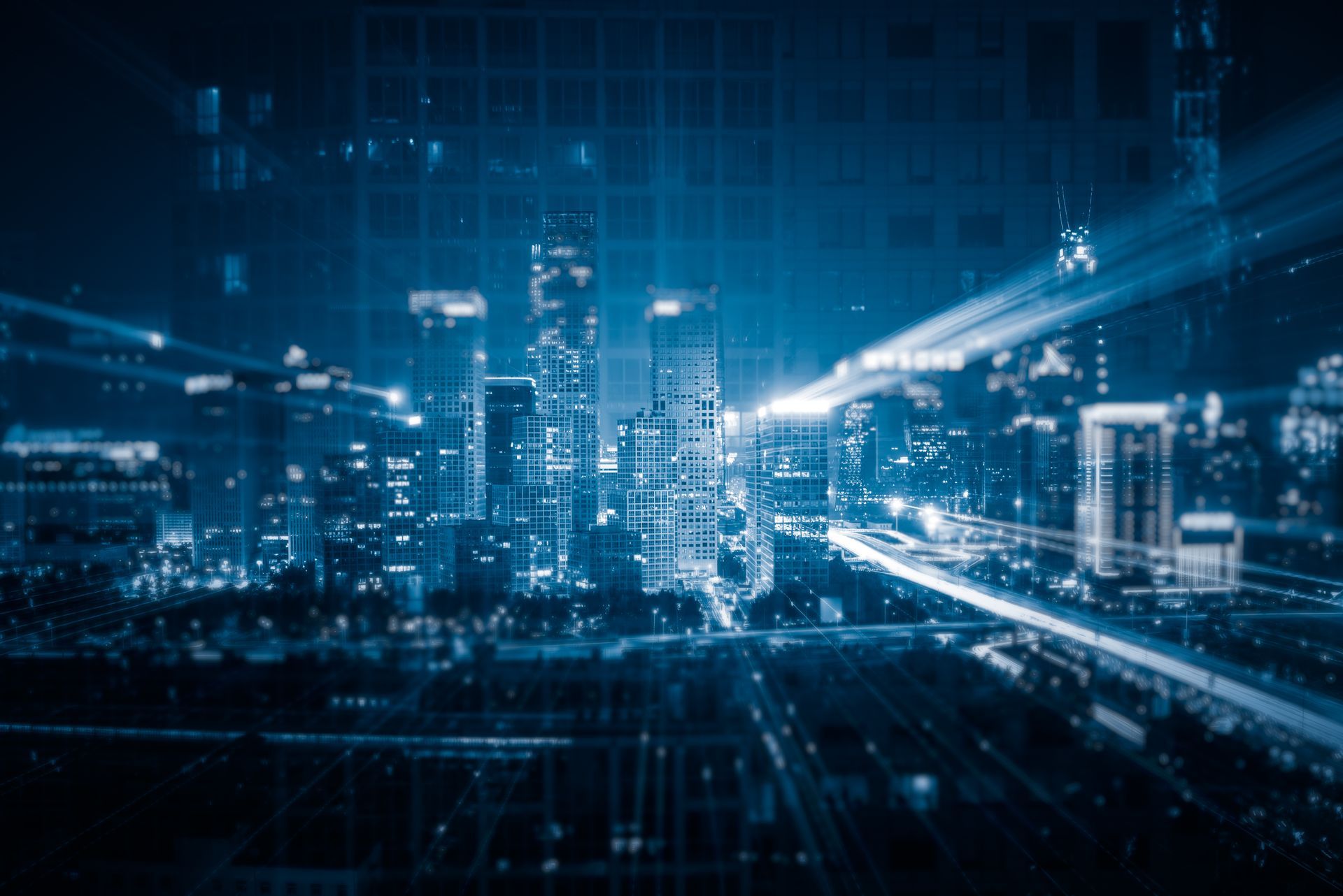 It is a blurry picture of a city at night.