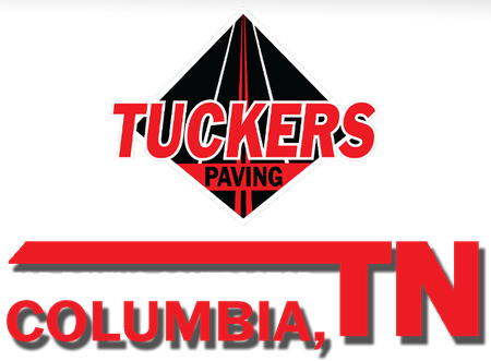 A logo for tucker 's paving in columbia tn