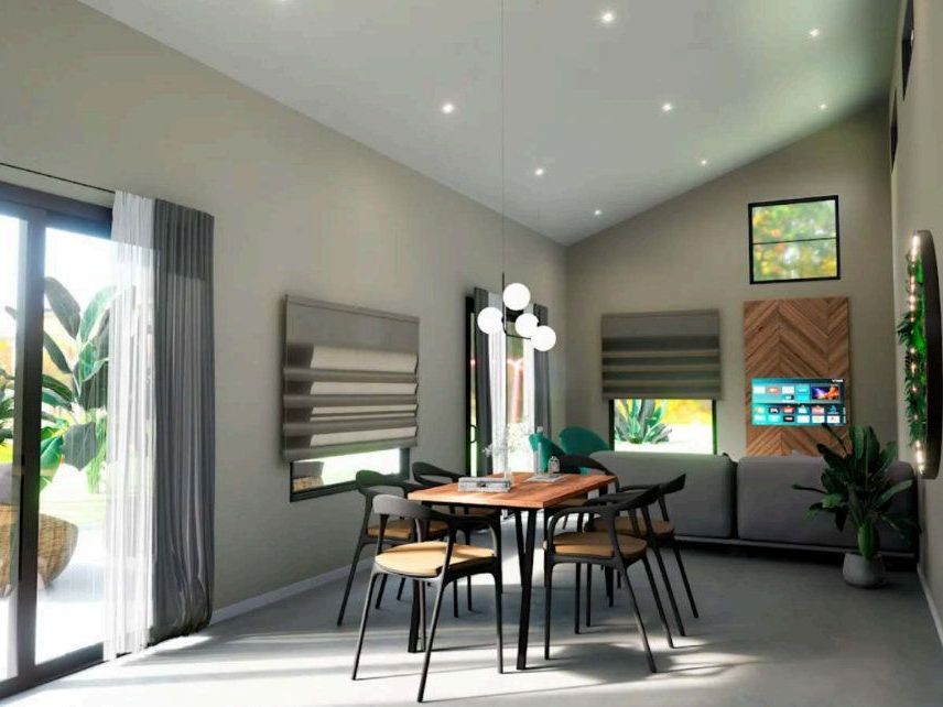 a dining room with a table and chairs in it