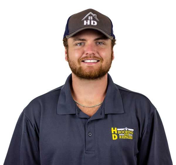 Man in polo shirt and hat smiling, logo 