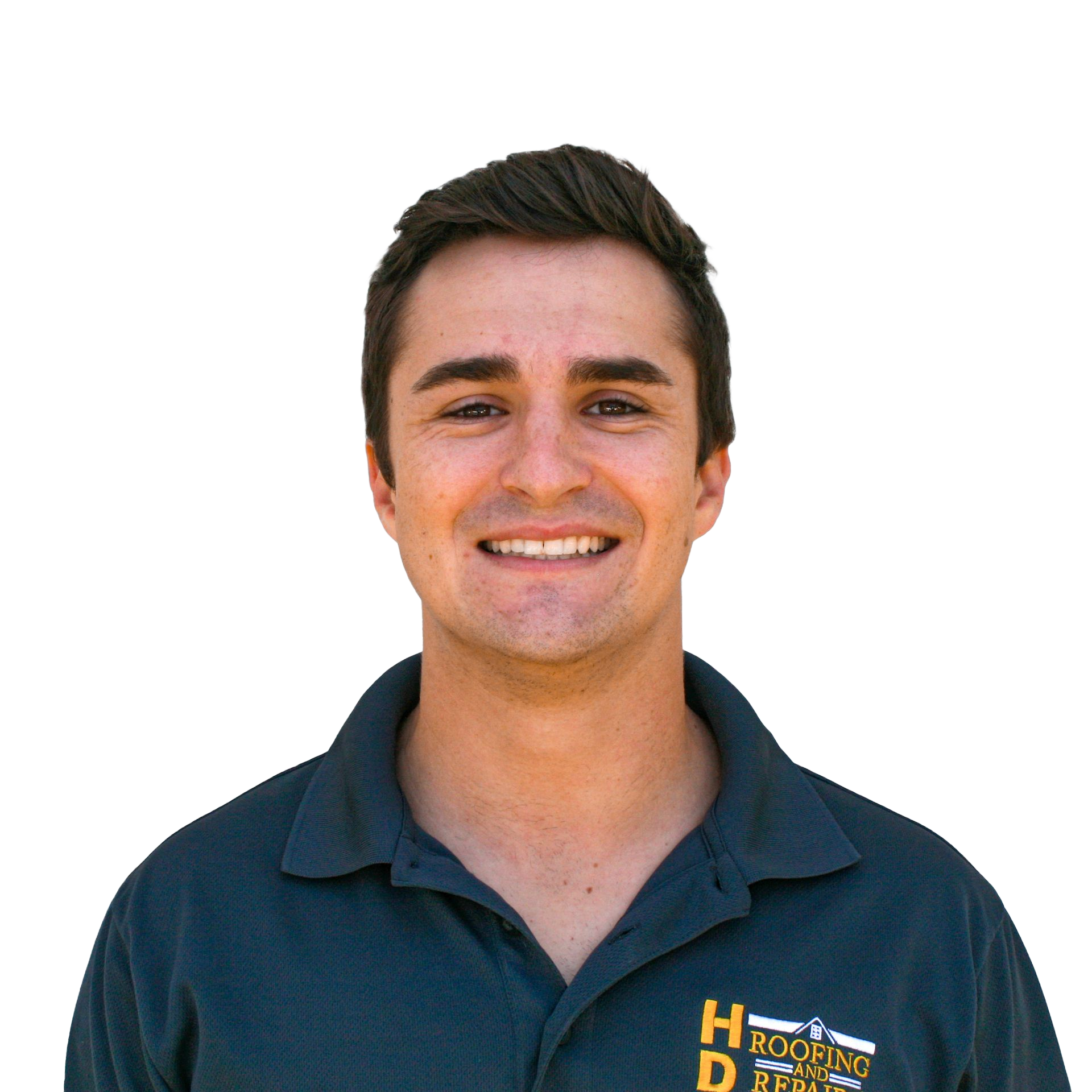 Smiling man in a dark blue polo shirt, against a yellow background.