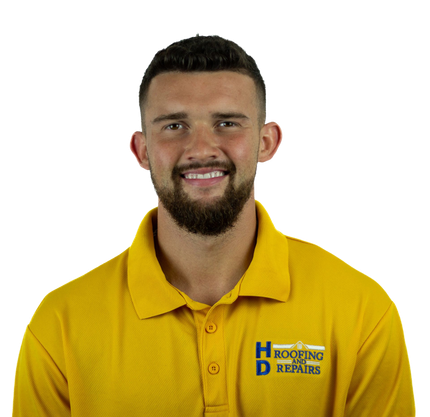 Man in yellow polo smiling, logo on shirt says "HD Roofing & Repairs."