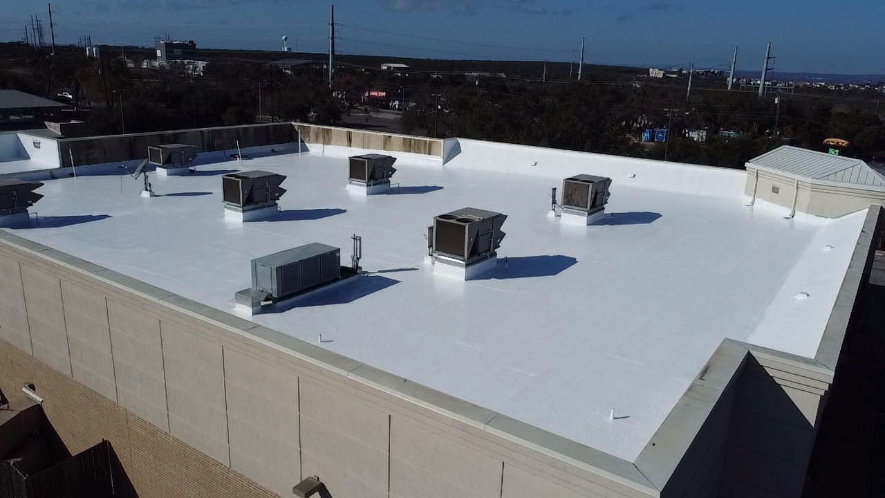 Commercial roof replacement Austin TX low slope roof system