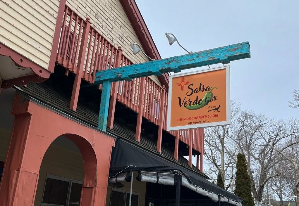A restaurant with a sign that says salsa verde on it.