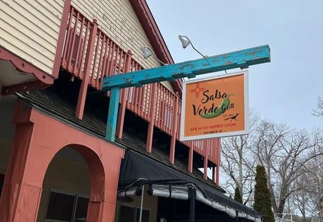 A restaurant with a sign that says salsa verde on it.