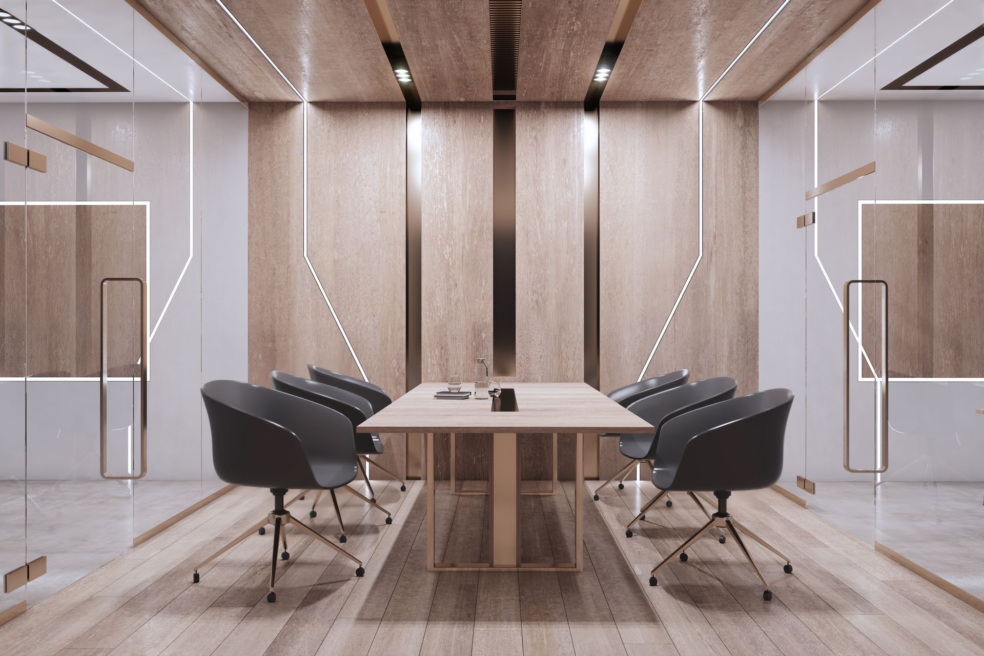 Modern conference room with a long wooden table, black chairs, and glass walls in a bright minimalist office.