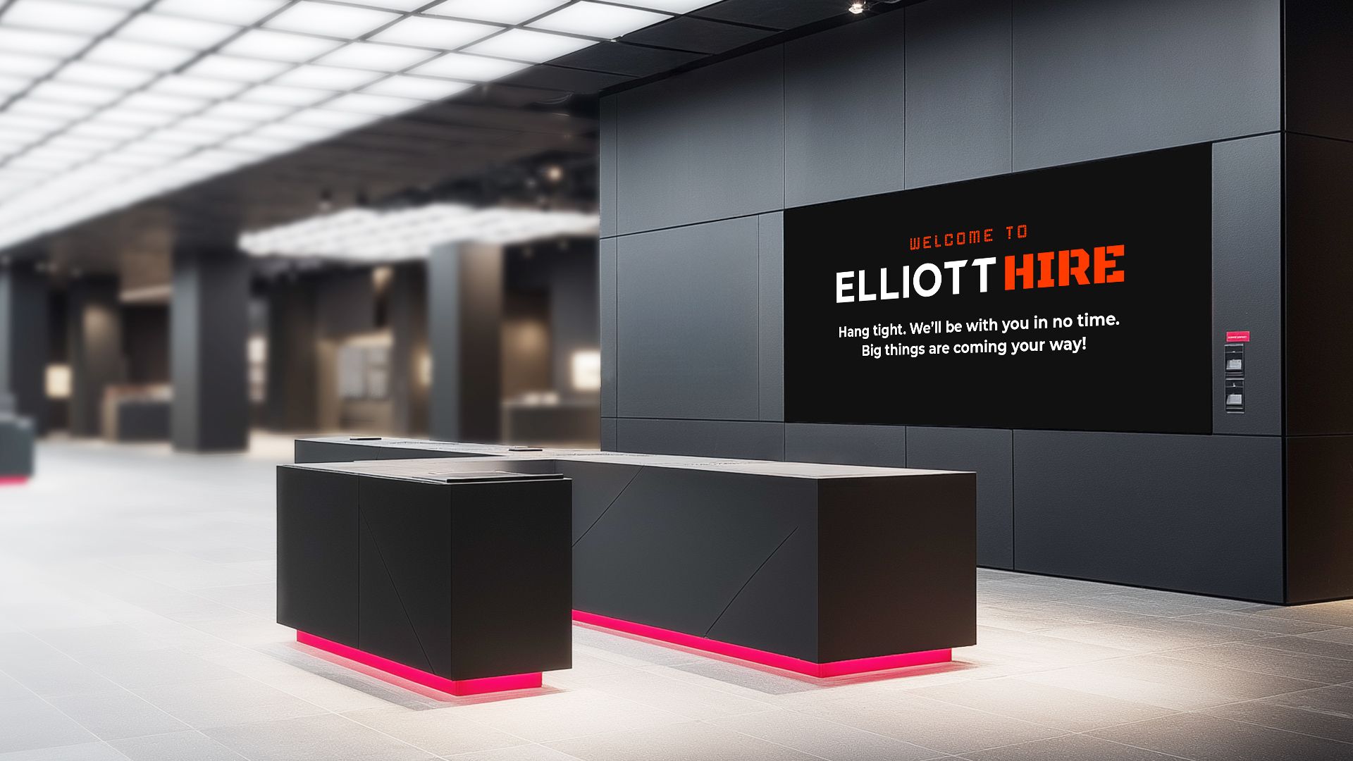 A group of people are sitting in a room on a video call.